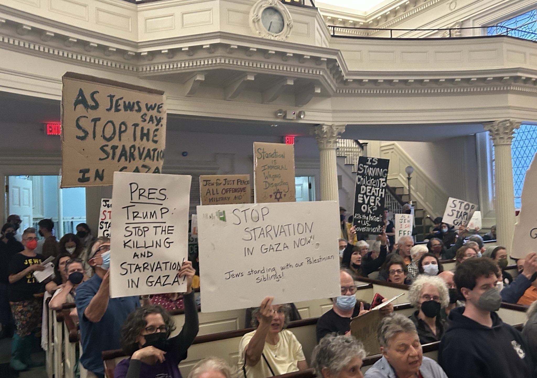 Activists take part in a protest on Thursday, July 31, 2025, calling for an end to Israel's "ongoing forced starvation in Gaza."